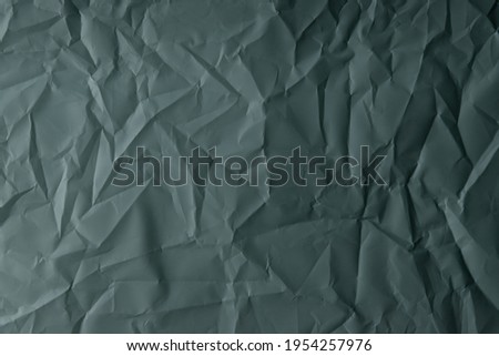 crumpled paper. sheet of paper Dark Jungle Green and Outer Space Slate colors. detailed high resolution texture. abstract background for wallpaper.