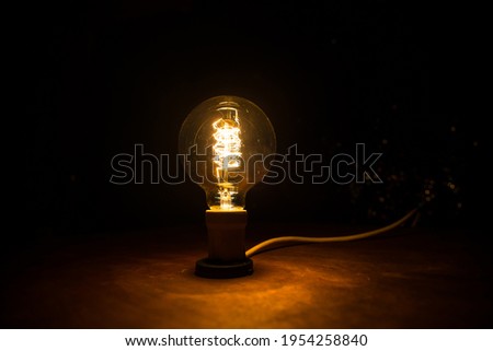 Beautiful retro luxury interior bulb lighting lamp decor glowing in dark. Selective focus