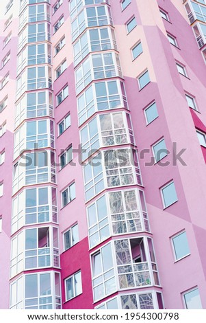 pink new building, pink high-rise building, windows on colorful building