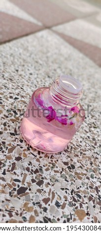 Nature pic of water with flower petals