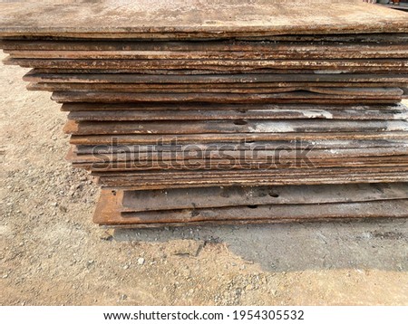 Steel plate rusted at the construction site, closeup of photo