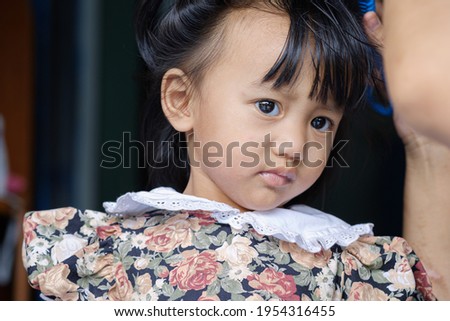 Portrait of asian baby girl , Face looking at glancing
