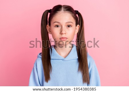 Portrait of nice attractive content cute serious preteen girl wearing cozy clothes isolated over pink pastel color background Royalty-Free Stock Photo #1954380385