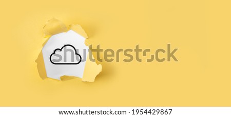 Torn yellow paper with cloud icon on white background.Cloud computing concept - connect devices to cloud.The concept of cloud service. Computing network and icon connection data information space