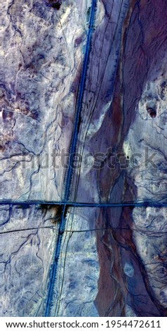 night crossing of roads,  vertical abstract photography of the deserts of Africa from the air, aerial view of desert landscapes, Genre: Abstract Naturalism, from the abstract to the figurative,