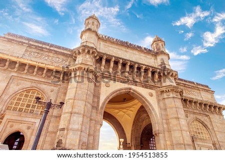 Low angle shot of The Gateway of India is an arch monument built during the 20th century in Bombay, India.  Royalty-Free Stock Photo #1954513855