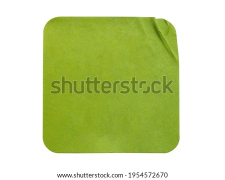 Blank green square adhesive paper sticker label isolated on white background