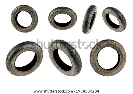 Old rubber tires. A set of old bicycle tires isolated on a white background and shown from different sides.