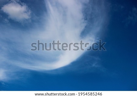 blue sky and blurry white clouds. clear sunny day. picture for background.