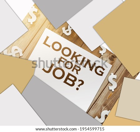 Looking for job .words asking someone to work together for certain job or project. Page on wooden backdrop and paper dollar signs around. Career concept.