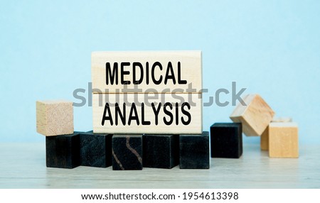 MEDICAL ANALYSIS . The text is on the dark and light cubes. Bright solution for Medical, marketing concept