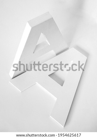 Letter A made from white PVC isolated on a white background. Royalty-Free Stock Photo #1954625617