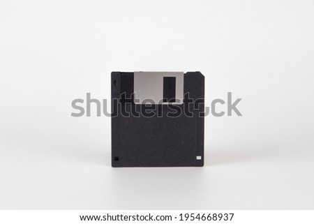 black floppy disk (Type-A) on the white floor