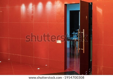 Open door to the womens toilet. Background with copy space for text or lettering