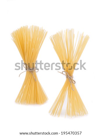Bow tie of italian spaghetti pasta. Isolated on a white background.