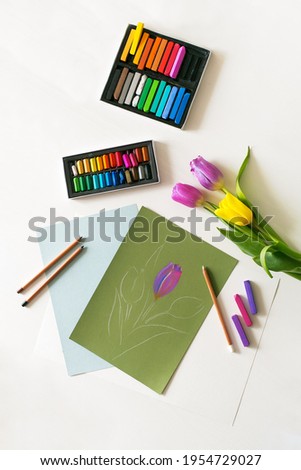 Pastel painting with fresh tulips. Soft pastel drawing, painting of flowers. Top view