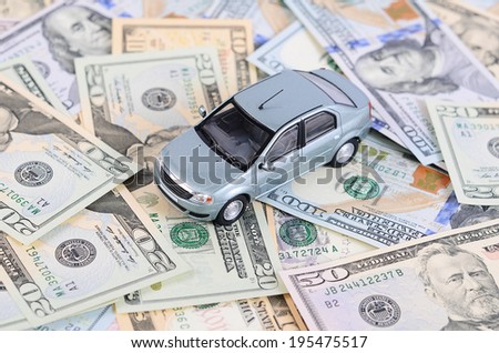 car model on dollar bills. Business concept