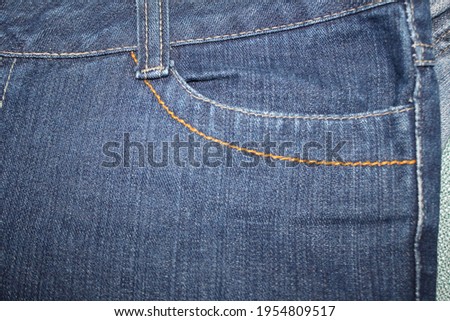 left front pocket blue jeans