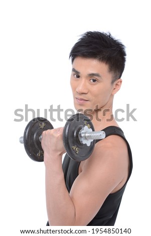 Athletic young man doing exercise dumbbell,