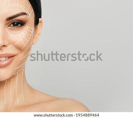 Lifting skin. Lifting lines on half of a woman's face, advertising of face contour correction, skin and neck lifting. Facial rejuvenation concept Royalty-Free Stock Photo #1954889464