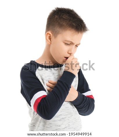 Ill coughing little boy on white background Royalty-Free Stock Photo #1954949914