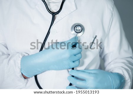A doctor or scientist holding a stethoscope The concept of health care 
