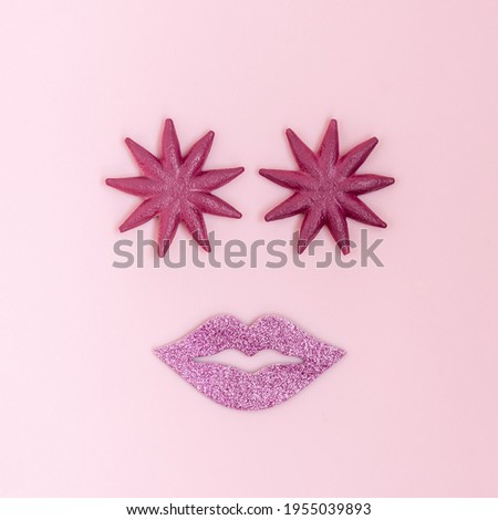 Pretty anthropomorphic mermaid face, with starfish eyes and shiny lips, great design for spa, beaches, summer vacations. Pink background.