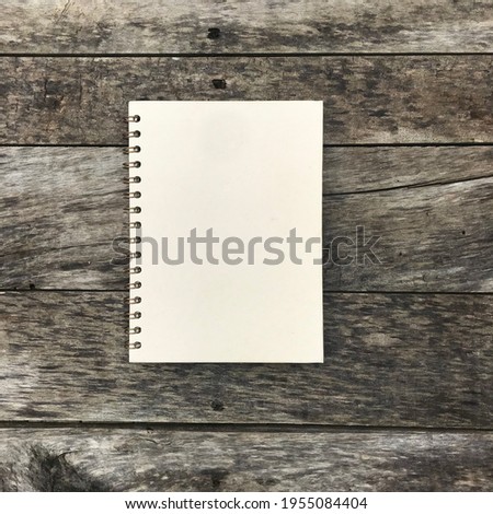 beautiful notebooks with blank covers with natural backgrounds