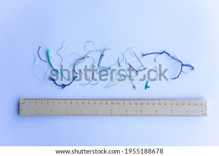 Stock photo of microplastics on a soft blue background	