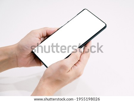 Hand hold smart phone white blank screen