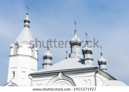 Orthodox church roof background. Metal domes with cross landscape. Religious building architecture of Eastern Europe. Metal roof building landscape.