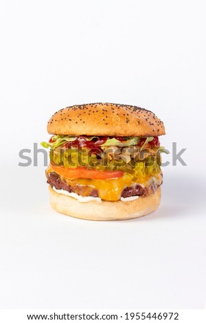Cheeseburger and bacon on white background