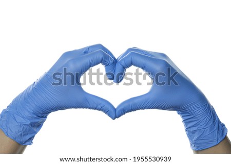 Hands in medical gloves shows heart, isolated on white background
