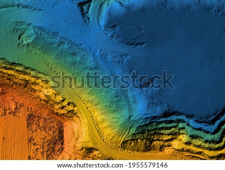Model of a mine elevation. GIS product made after processing aerial pictures taken from a drone. It shows excavation site with steep rock walls Royalty-Free Stock Photo #1955579146
