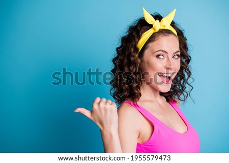 Profile side photo of charming woman point thumb empty space wear yellow headband isolated on blue color background