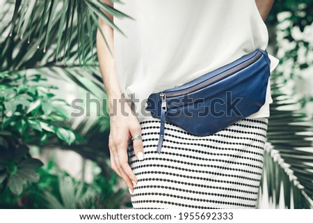 This belt bag women may also use as a shoulder bag or cross body bag. Royalty-Free Stock Photo #1955692333