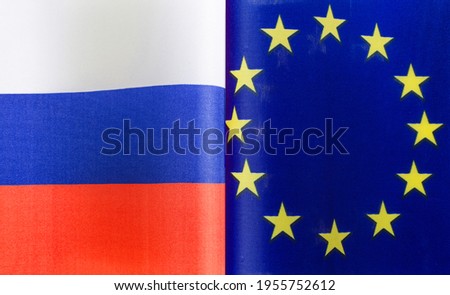 fragments of the national flags of Russia and the European Union close-up