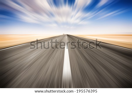 Speed road across the salt lake of Chott El Djerid, Tunisia.