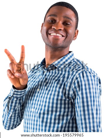 Happy businessman making peace sign on white background