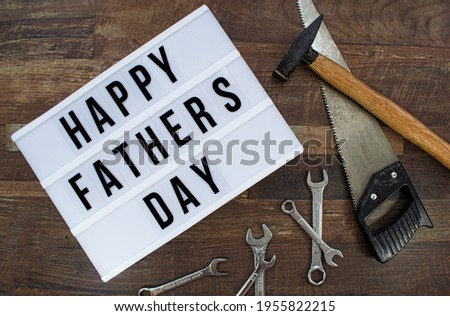 Happy Father´s Day background with Various tools on a wooden background, Top view.
