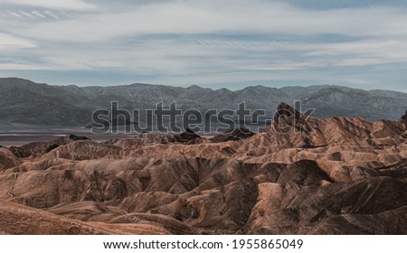 a canyon with a mountain in the background