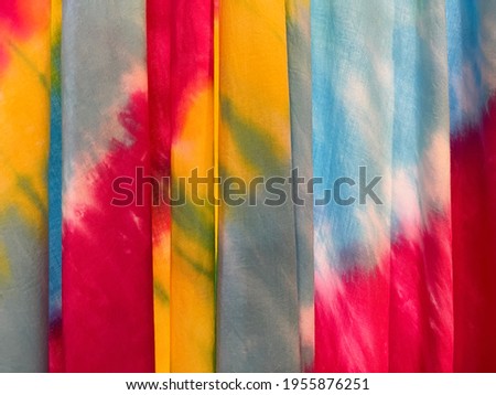 Colorful tie-dye pattern on the curtains. Colorful tie dye pattern abstract background, Abstract batik brush seamless and repeat pattern design, Shibori, wallpaper, background.