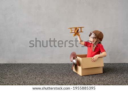 Child pretend to be sailor. Kid having fun at home. Summer vacation and travel concept