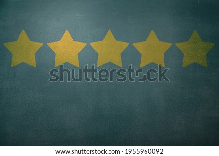 Five start icons on concrete wall background,