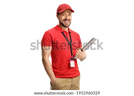 Sales clerk smiling at camera isolated on white background Royalty-Free Stock Photo #1955960329