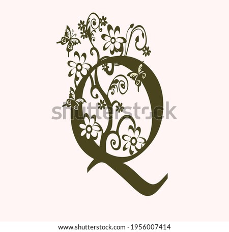 the initials Q. monogram logo with flower and butterfly decoration. luxury beauty