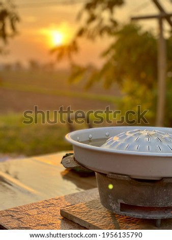 Thai barbecue pan stove in the rice fields