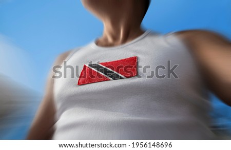 The national flag of Trinidad and Tobago on the athlete's chest