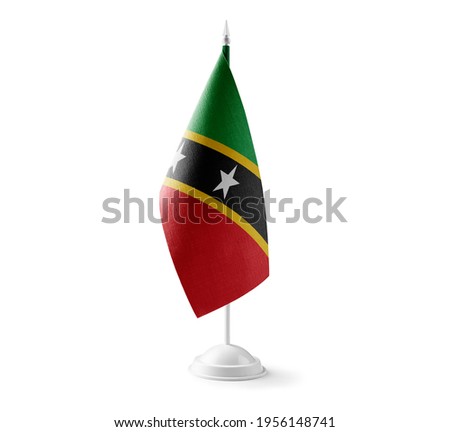 Small national flag of the Saint Kitts and Nevis on a white background