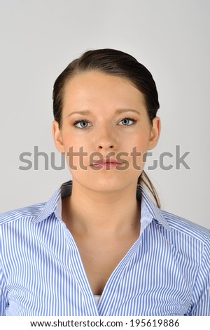 Business portrait of a dark haired woman.